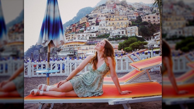 Lulu Simon on a beach in Italy