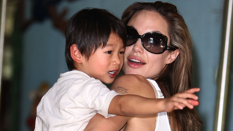 Angelina Jolie holding Pax Jolie-Pitt