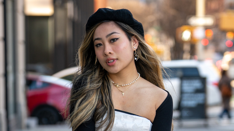 Woman wearing pearl necklace