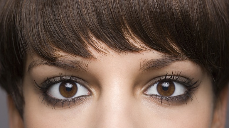 woman with bangs close-up