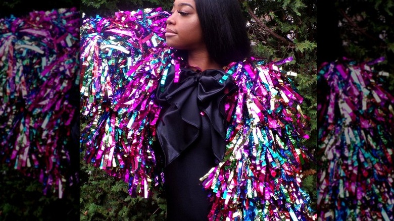 woman wearing tinsel jacket