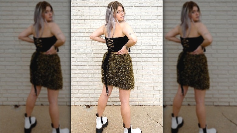 woman wearing tinsel skirt