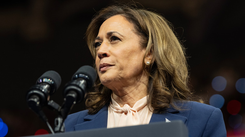 Kamala Harris making speech standing at podium