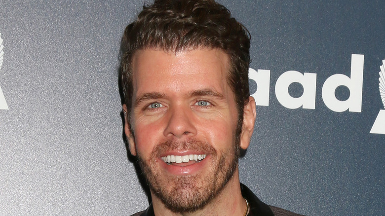 Perez Hilton poses on the red carpet