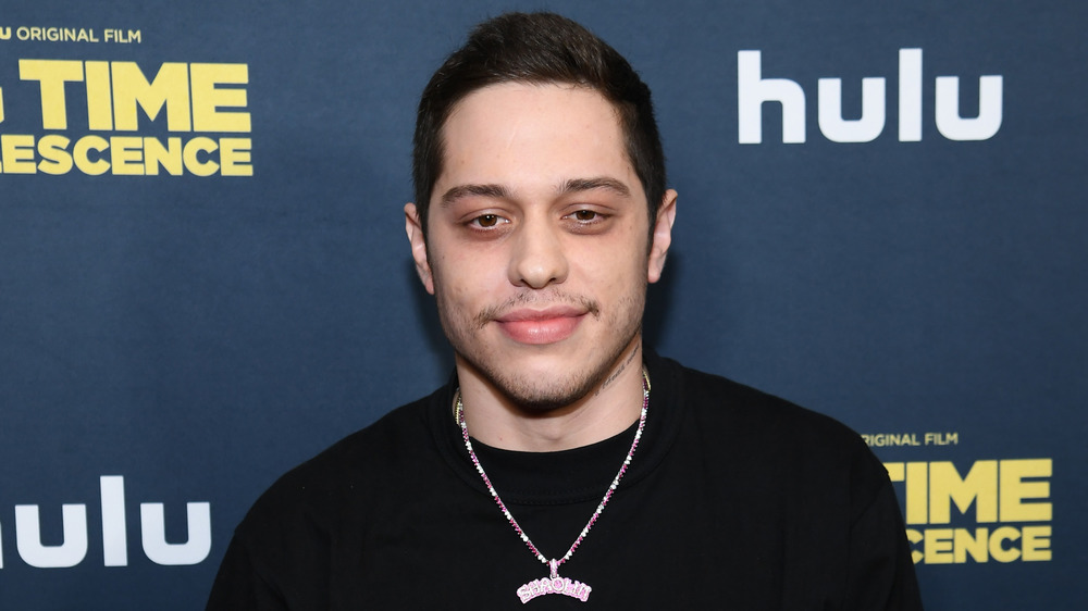 Pete Davidson wearing necklace