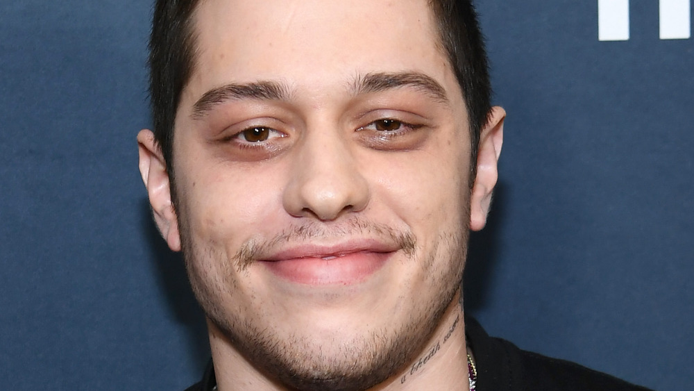 Pete Davidson smiling with scruff