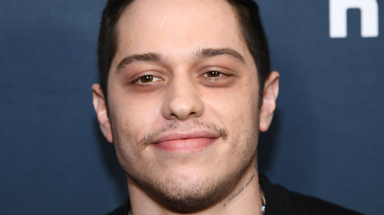 Pete Davidson smiling at event