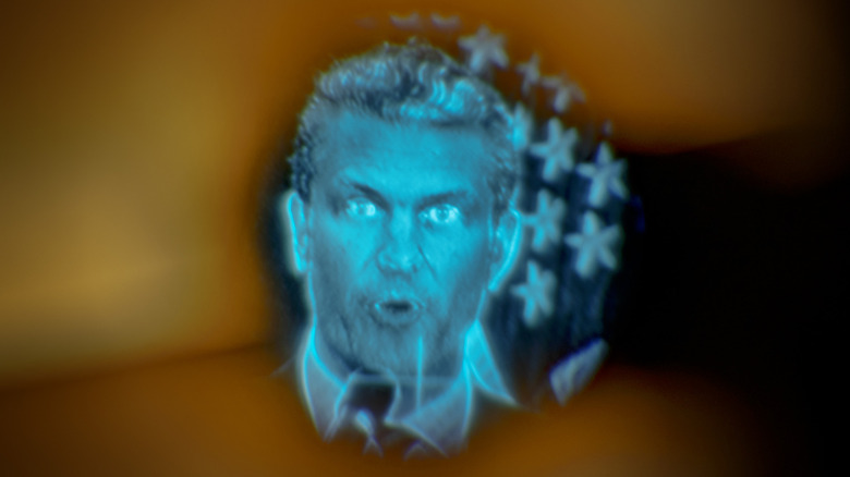 U.S. Defense Secretary Pete Hegseth is seen on the viewfinder of a video camera as he speaks during his visit at Camp Aguinaldo on March 28, 2025 in Quezon city, Metro Manila, Philippines.