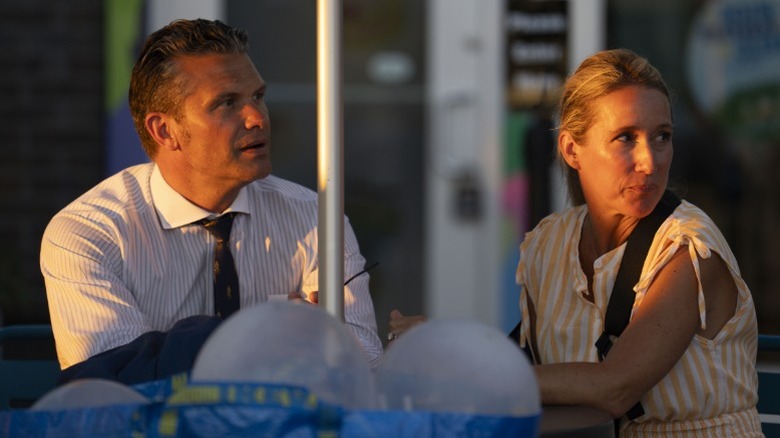 Pete Hegseth and Jennifer Hegseth sit outside a Ben and Jerry's in Washington, DC (2025)