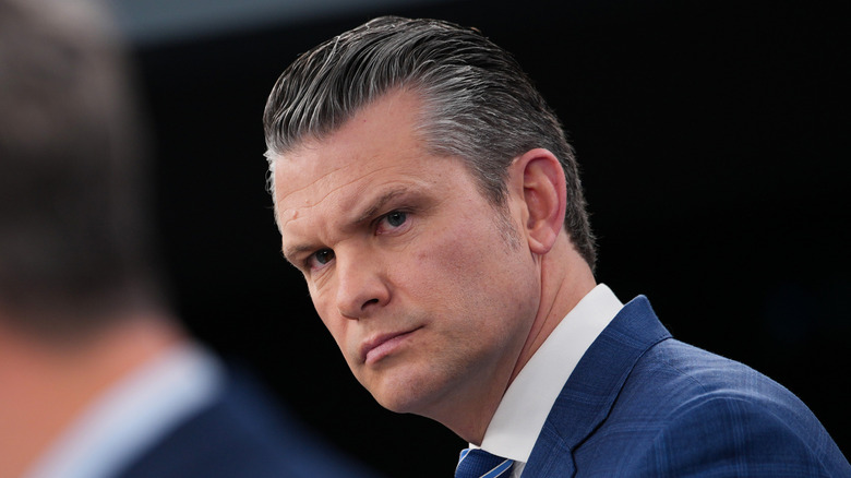 Pete Hegseth looking to the left