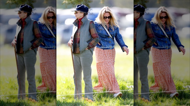 Princess Anne walks next to Autumn Kelly at a horse event in 2025
