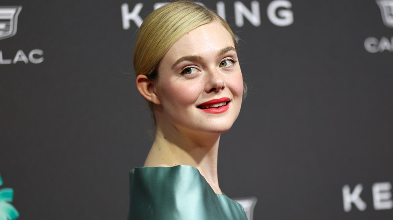 Elle Fanning wearing a mint green dress