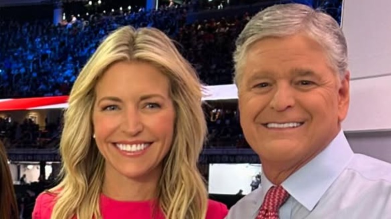 Sean Hannity and Ainsley Earhardt smile for a photo on the set of 'Fox and Friends' in July 2024 (2024)