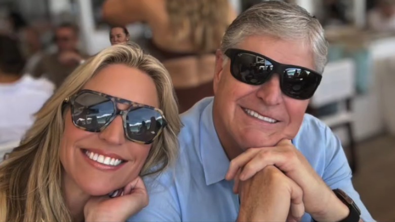 Sean Hannity and Ainsley Earhardt smile while taking photos together during a vacation (2025)