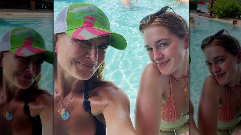 Brooke Shields in a baseball cap in a pool with Rowan Henchy