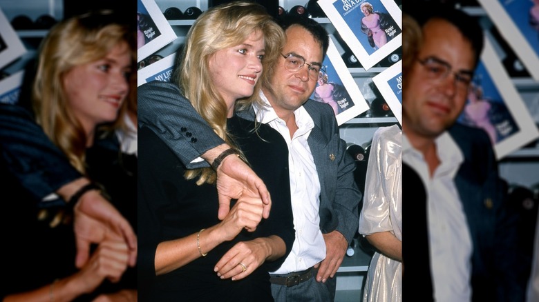Dan Aykroyd and Donna Dixon at an event for a book.