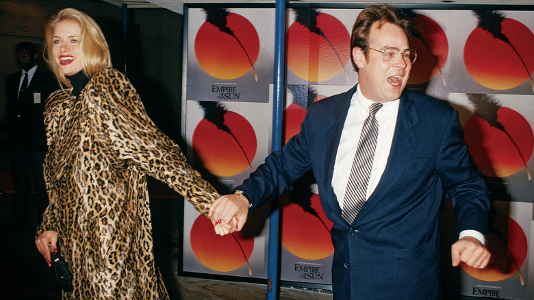 Donna Dixon and Dan Aykroyd at the premiere of Steven Spielberg's Empire of the Sun.