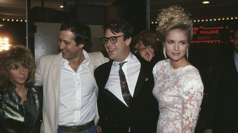Jayni Chase, Chevy Chase, Dan Akroyd, and Donna Dixon attend the premiere of 'Spies Like Us', held at Mann Bruin Theater in Los Angeles, California, 3rd December 1985..