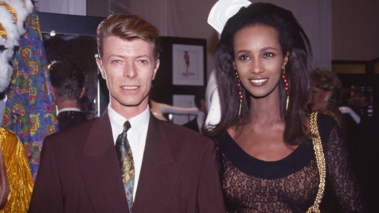 David Bowie and Iman attend the 7th on Sale to benefit AIDS research at the 69th Regiment Armory in New York City on November 29, 1990.