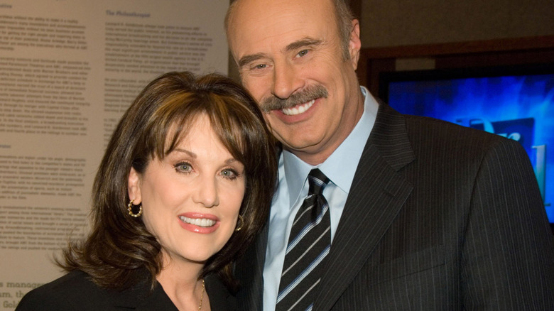 Robin McGraw and Phil McGraw smiling
