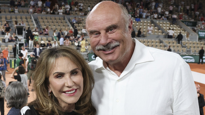 Robin McGraw and Dr. Phil McGraw smiling
