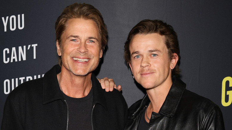 John Owen Lowe and Rob Lowe in black outfits