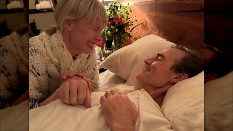 Erin Fetherston and James Van Der Beek smiling at each other