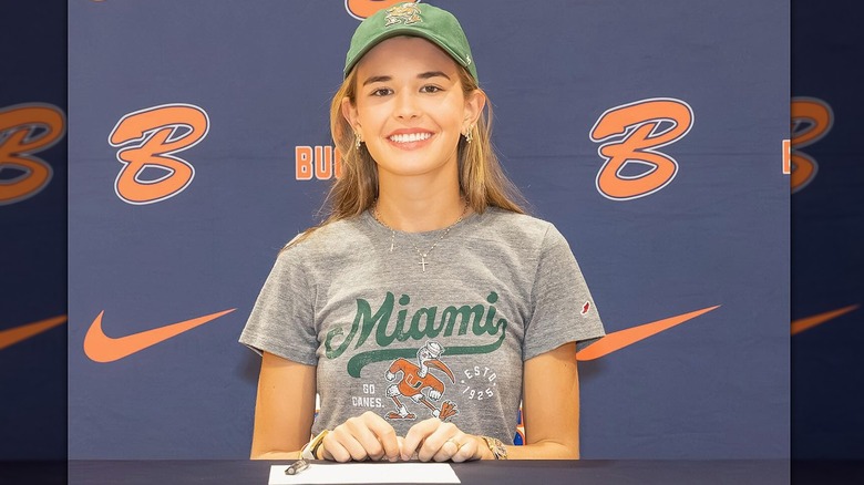 Kai Trump in U. Miami shirt signing day