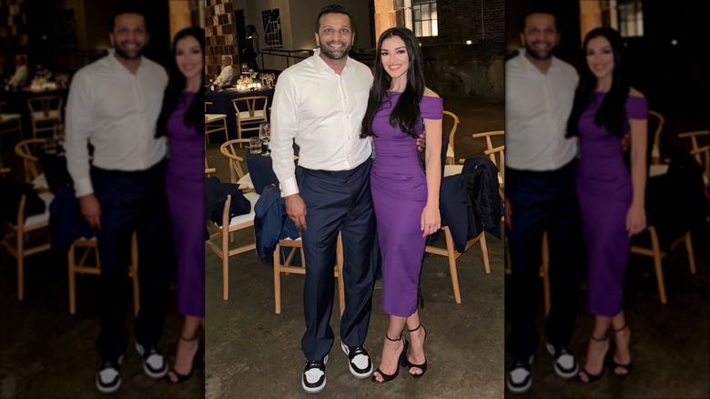 Kash Patel and Alexis Wilkins posing for a photo at a wedding