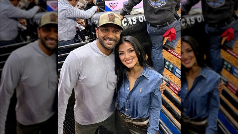 Kash Patel and Alexis Wilkins posing for a photo at a rodeo