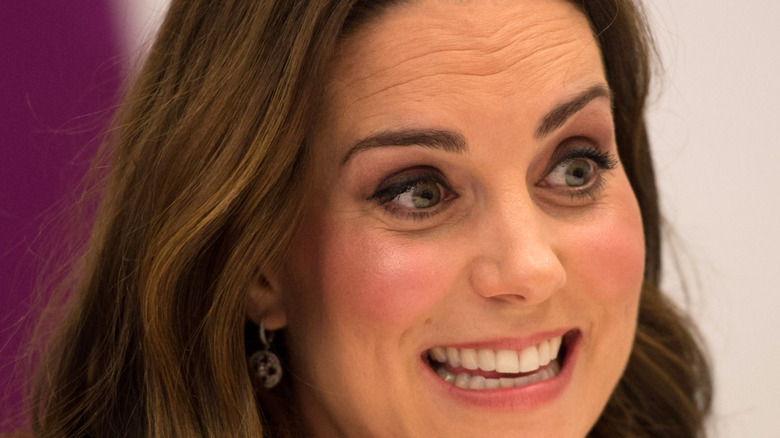 Close-up of Princess Catherine smiling at Stepping Out with wide eyes