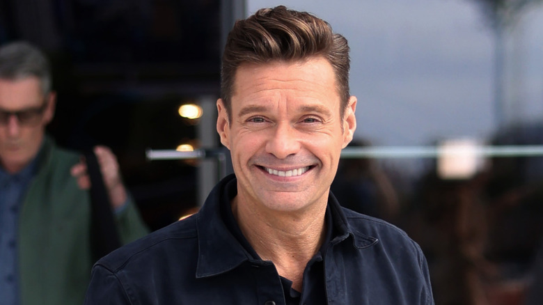 Ryan Seacrest wearing blue
