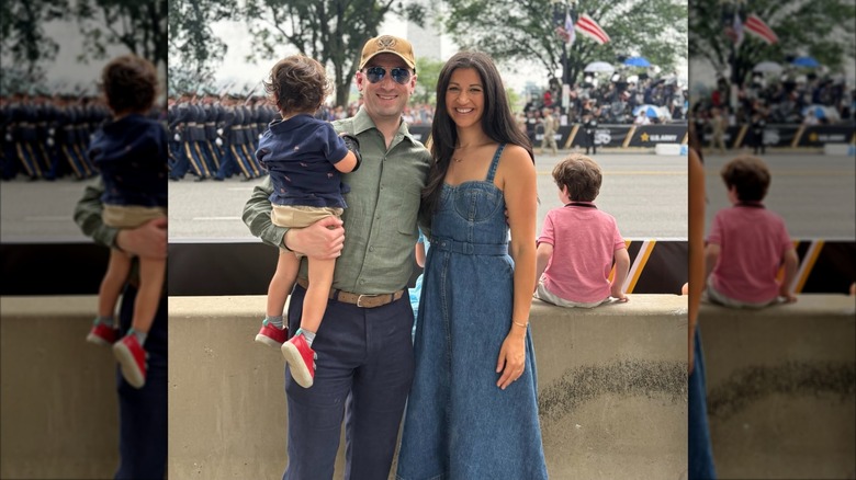 Stephen and Katie Miller posing with their child