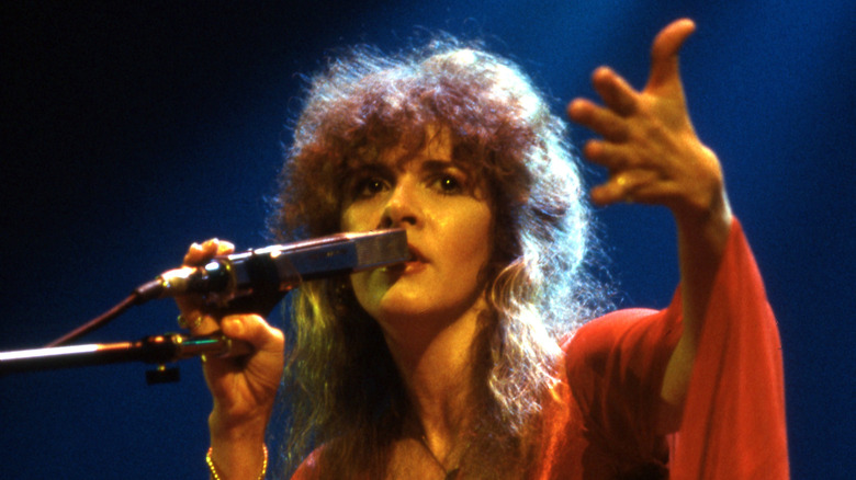 Stevie Nicks performing in 1979 wearing red