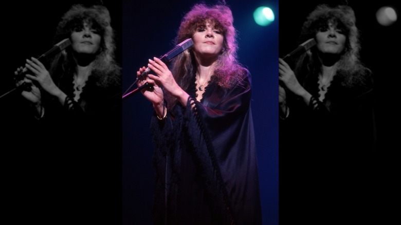 Stevie Nicks of Fleetwood Mac performing in 1979 wearing a floaty black dress
