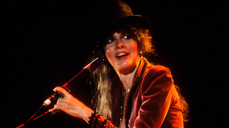 Picture of Stevie Nicks performing in 1979 in San Francisco and wearing a top hat