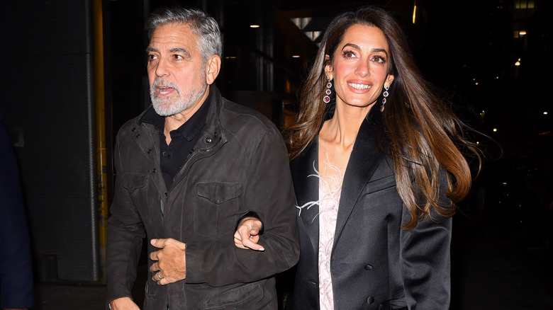 Amal Clooney and George Clooney walking in NYC