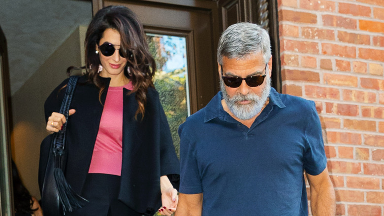 George Clooney and Amal Clooney walking in NYC