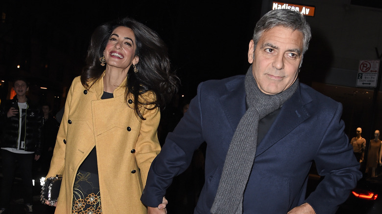 George Clooney and Amal Clooney walking in NYC
