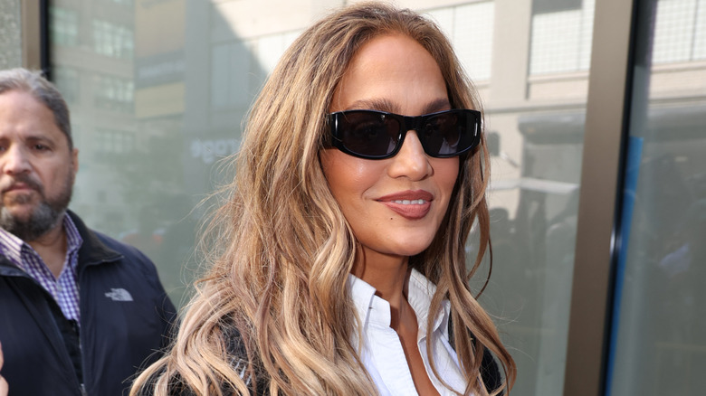 Jennifer Lopez in dark sunglasses walking along the streets of New York
