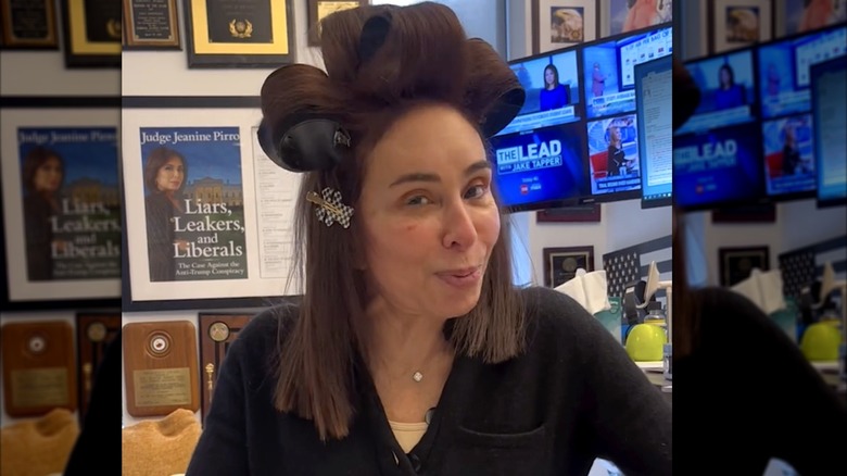 Judge Jeanine Pirro in office, hair in giant rollers and clips, wearing no makeup