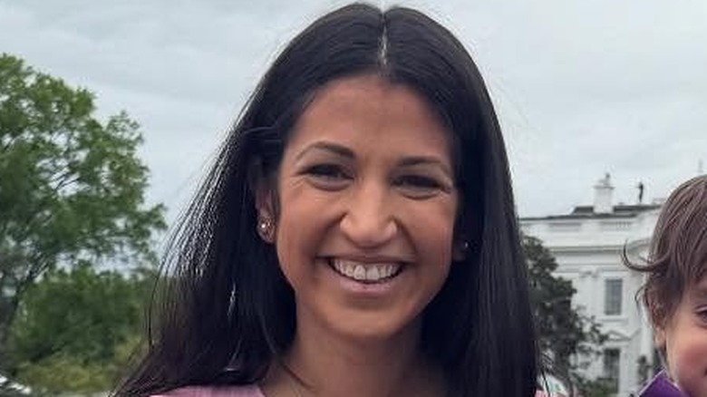 Katie Miller poses with her family on the White House South Lawn in Washington, DC (2025)