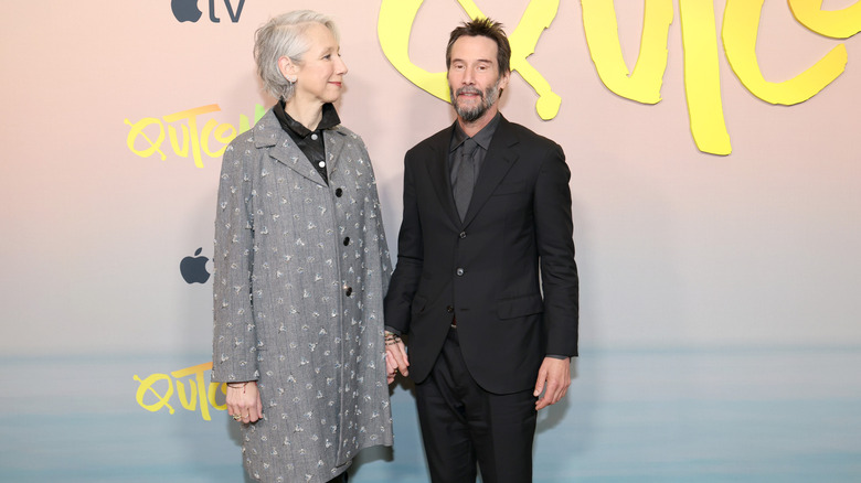 Alexandra Grant and Keanu Reeves attend the world premiere of Apple's "Outcome" at AMC Lincoln Square Theater on April 06, 2026 in New York City.