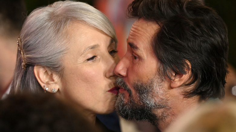 December 16, 2024: Alexandra Grant and Keanu Reeves at the premiere for Sonic the Hedgehog 3 at the TCL Chinese Theatre.