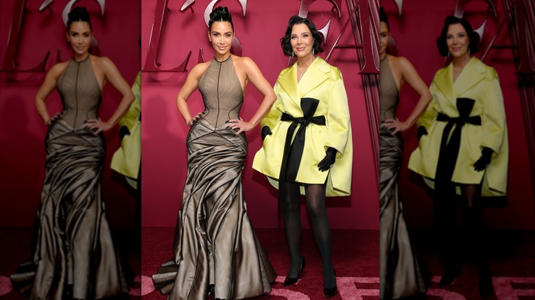 Kim Kardashian and Kris Jenner smiling together on the red carpet