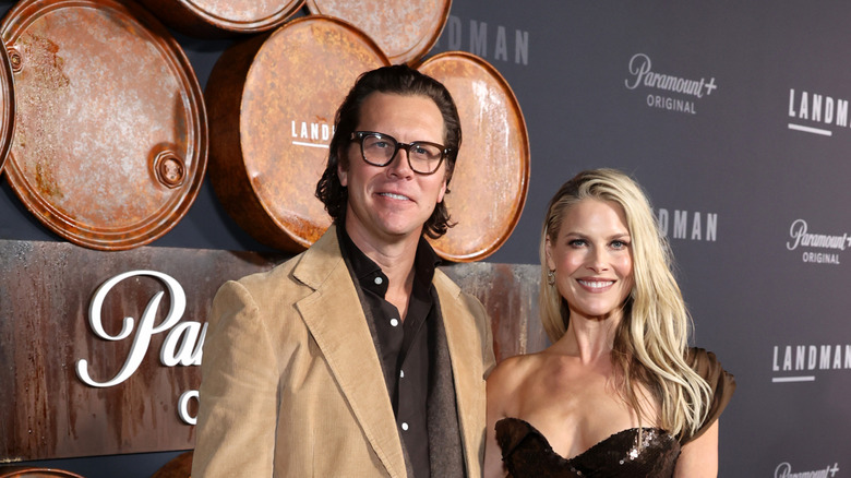 Hayes MacArthur tan suit Ali Larter brown dress