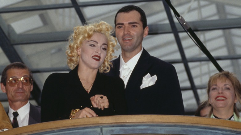Madonna and Christopher Ciccone looking deep in thought