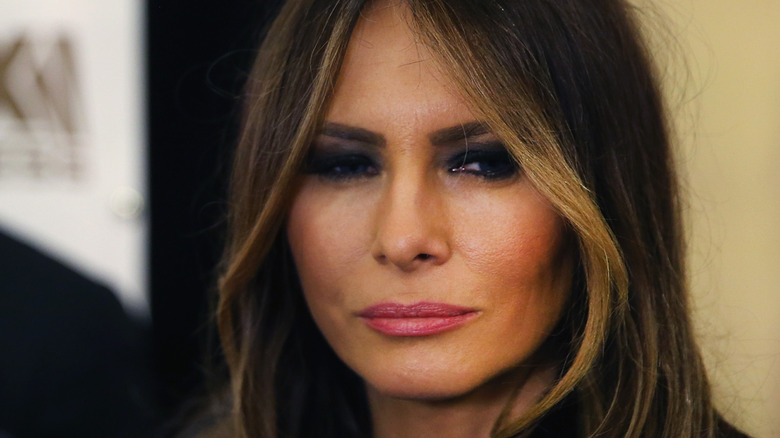 Melania Trump joins husband Donald Trump as he speaks with members of the media in the spin room after the Republican Presidential Debate sponsored by Fox Business and the Wall Street Journal at the Milwaukee Theatre on November 10, 2015 in Milwaukee, Wisconsin (2015)