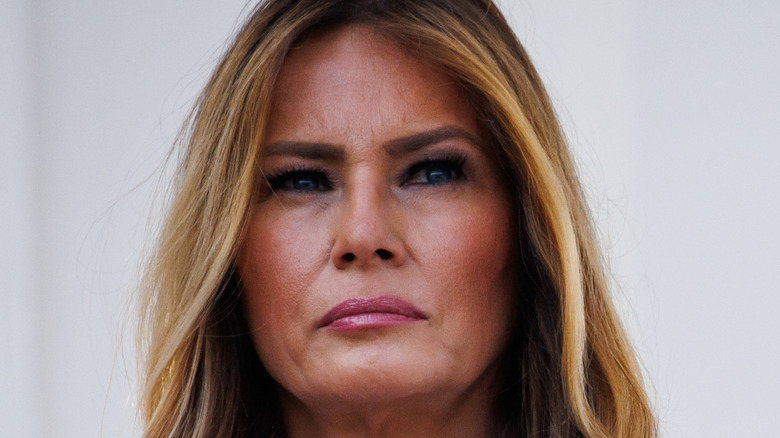 First lady Melania Trump listens as U.S. President Donald Trump (not pictured) delivers remarks during an Independence Day military family picnic on the South Lawn of the White House on July 4, 2025 in Washington, DC (2025)