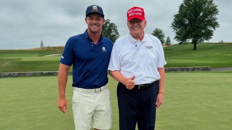 Bryson DeChambeau and Donald Trump pose together at Trump National Golf Club in Bedminster, NJ (2024)